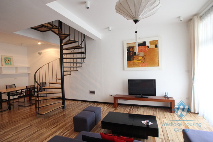 Bright duplex apartment for lease in Westlake area, Hanoi, fully furnished.
